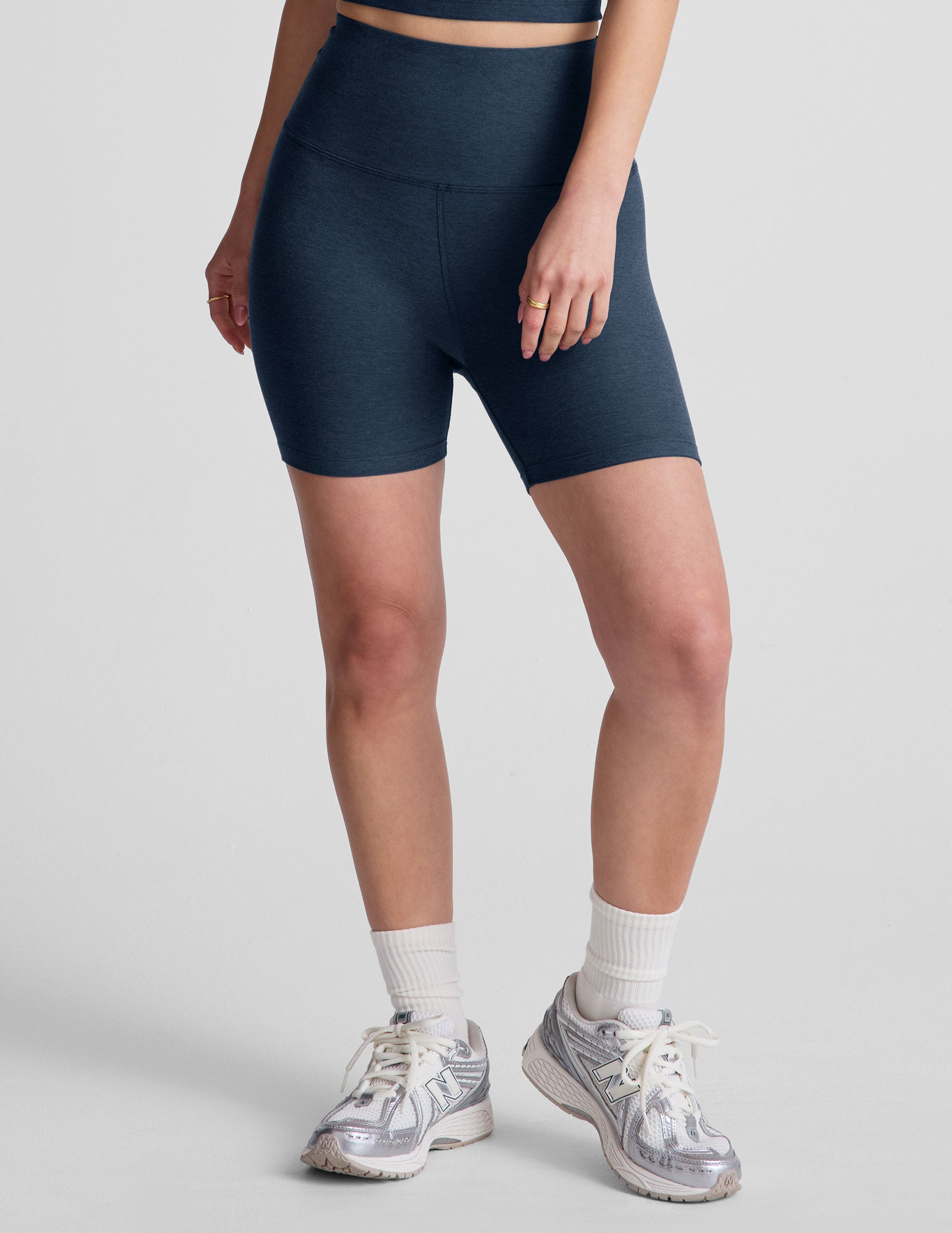 blue high-waisted 5" inseam biker shorts. 