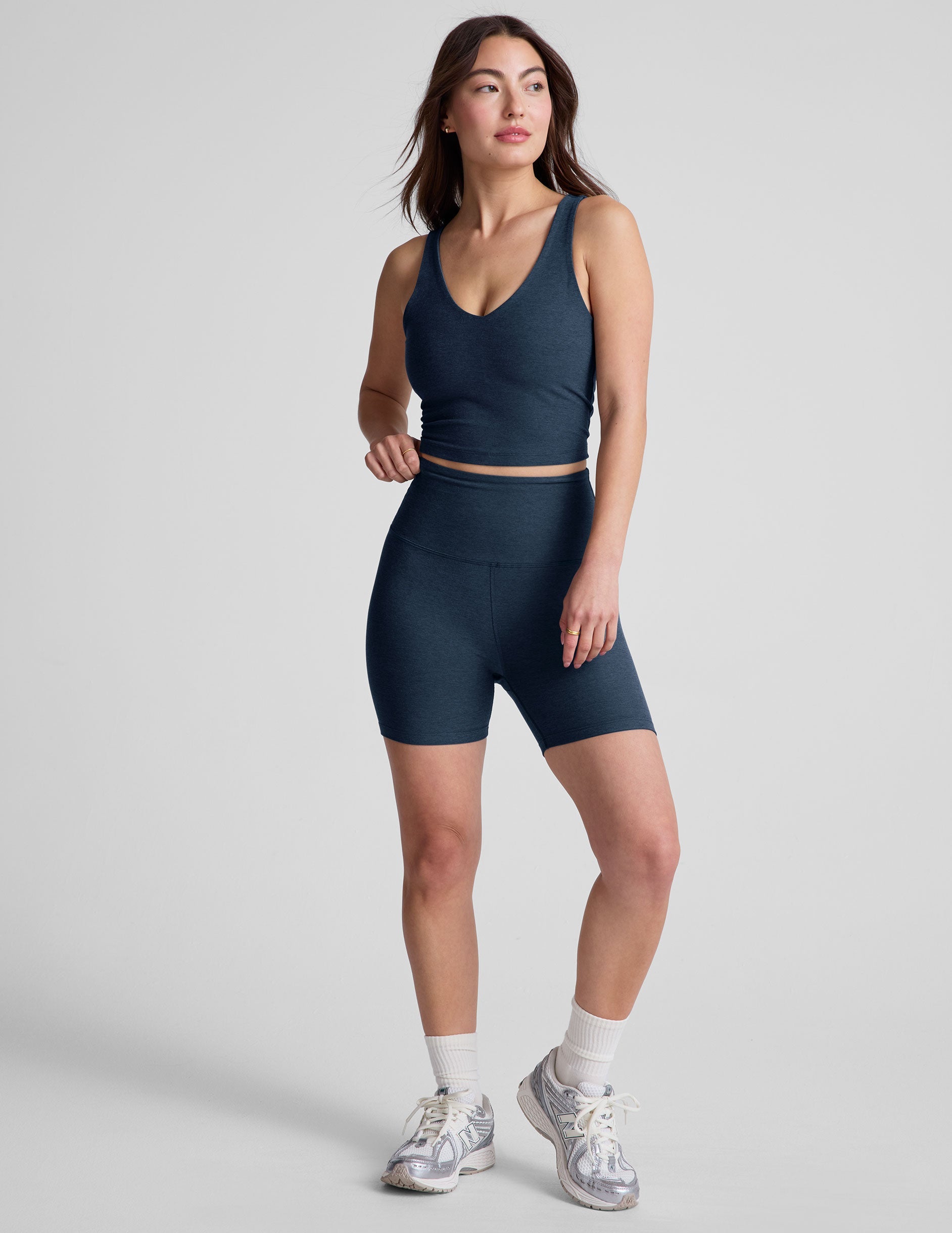 blue high-waisted 5" inseam biker shorts. 