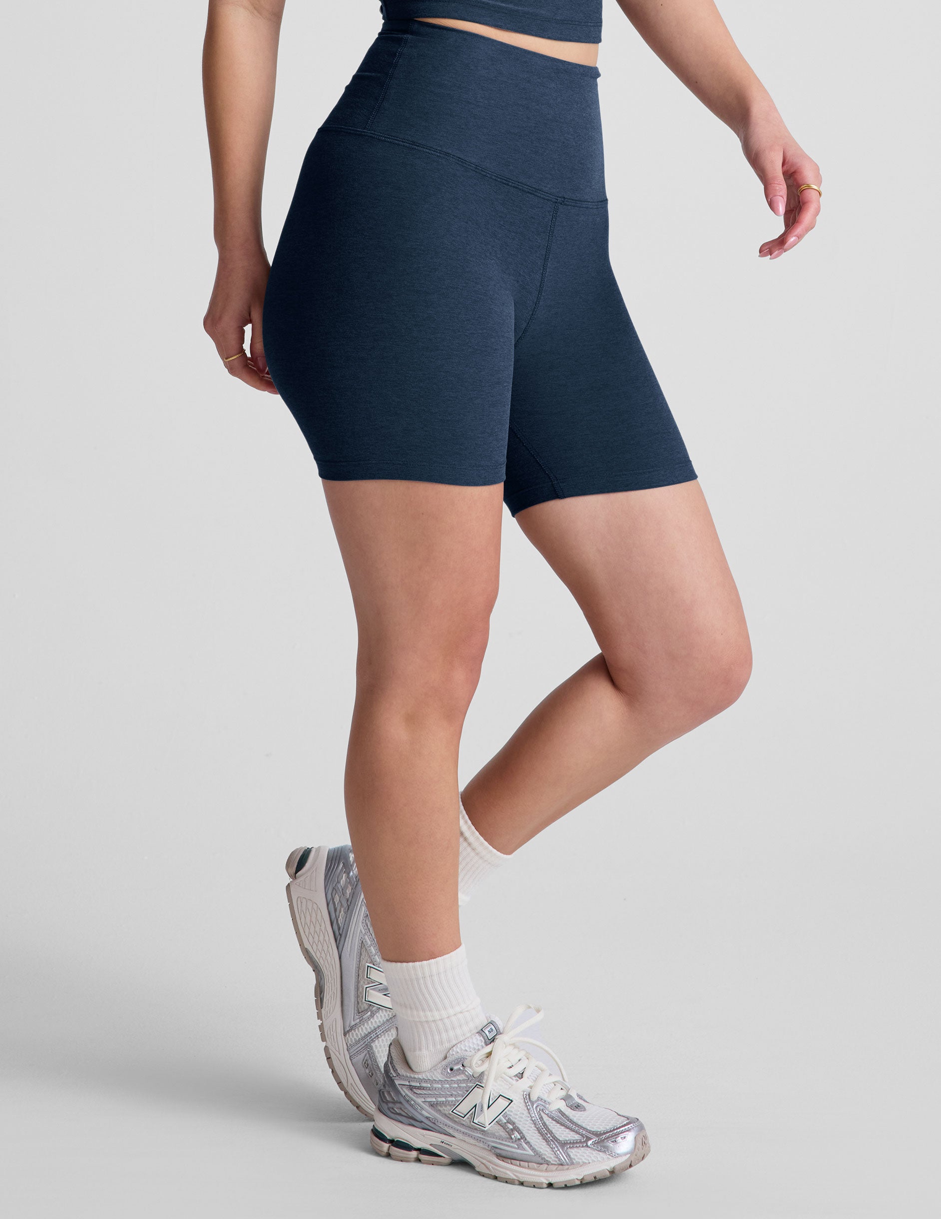 blue high-waisted 5" inseam biker shorts. 