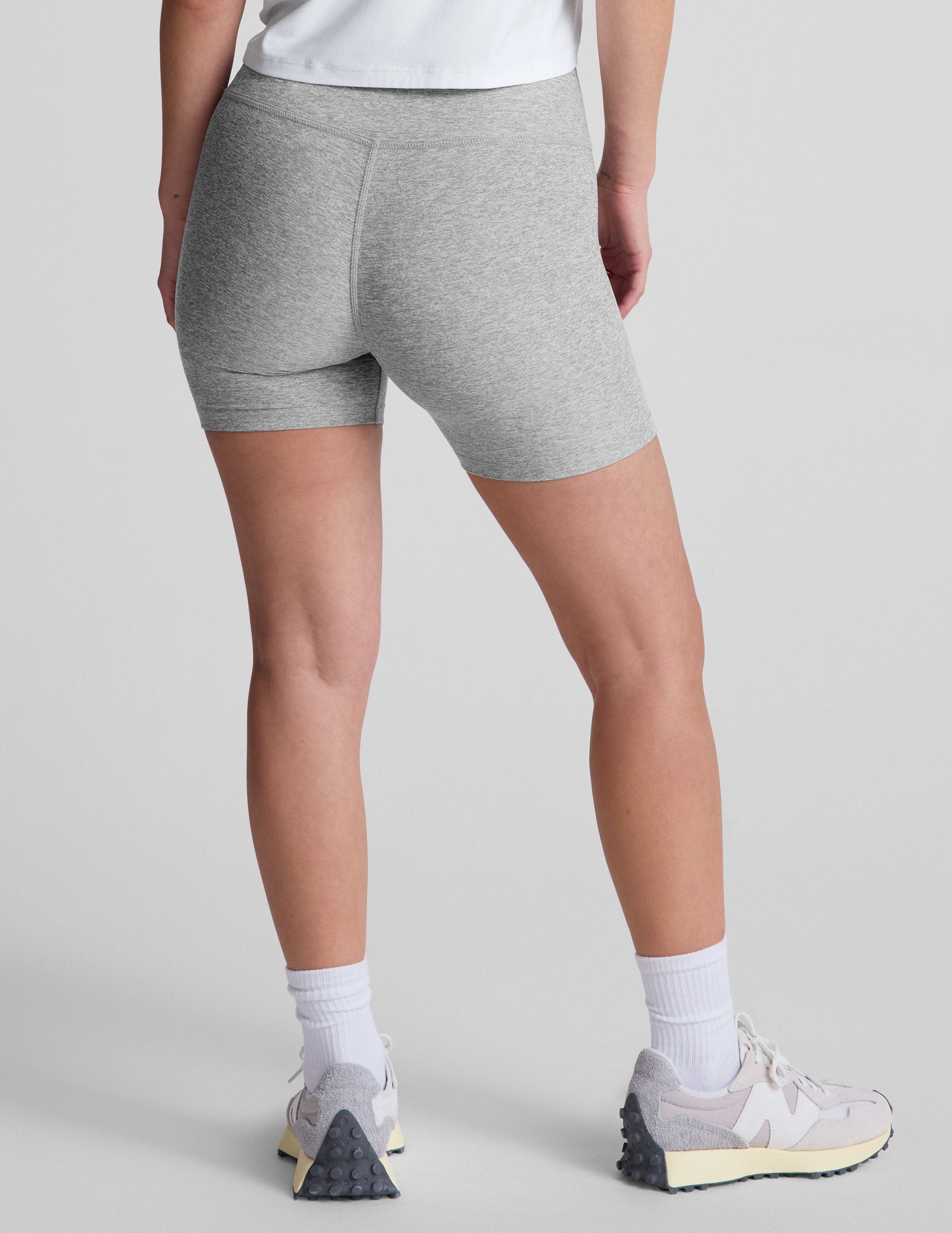 gray high-waisted 5" length biker shorts. 