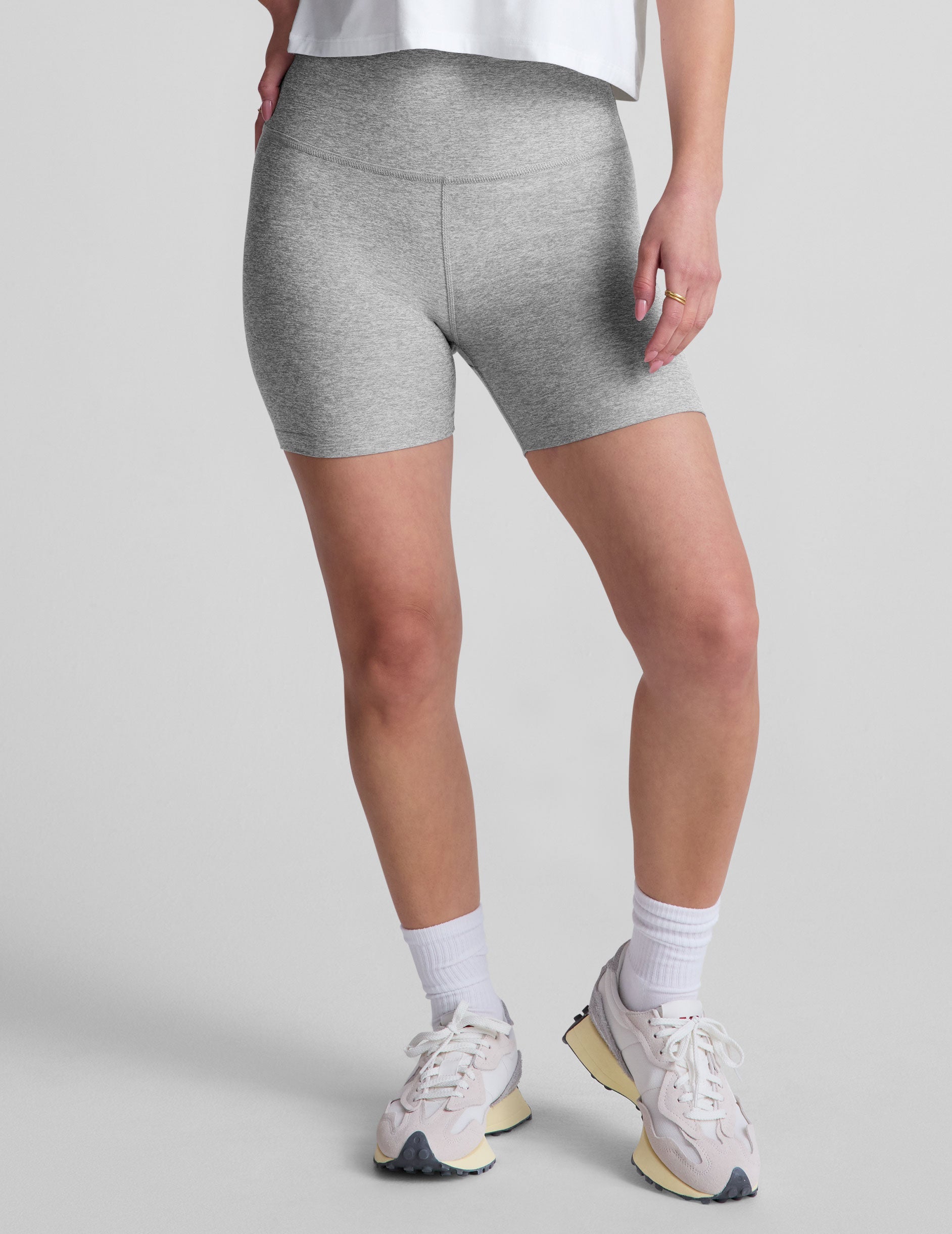 gray high-waisted 5" length biker shorts. 