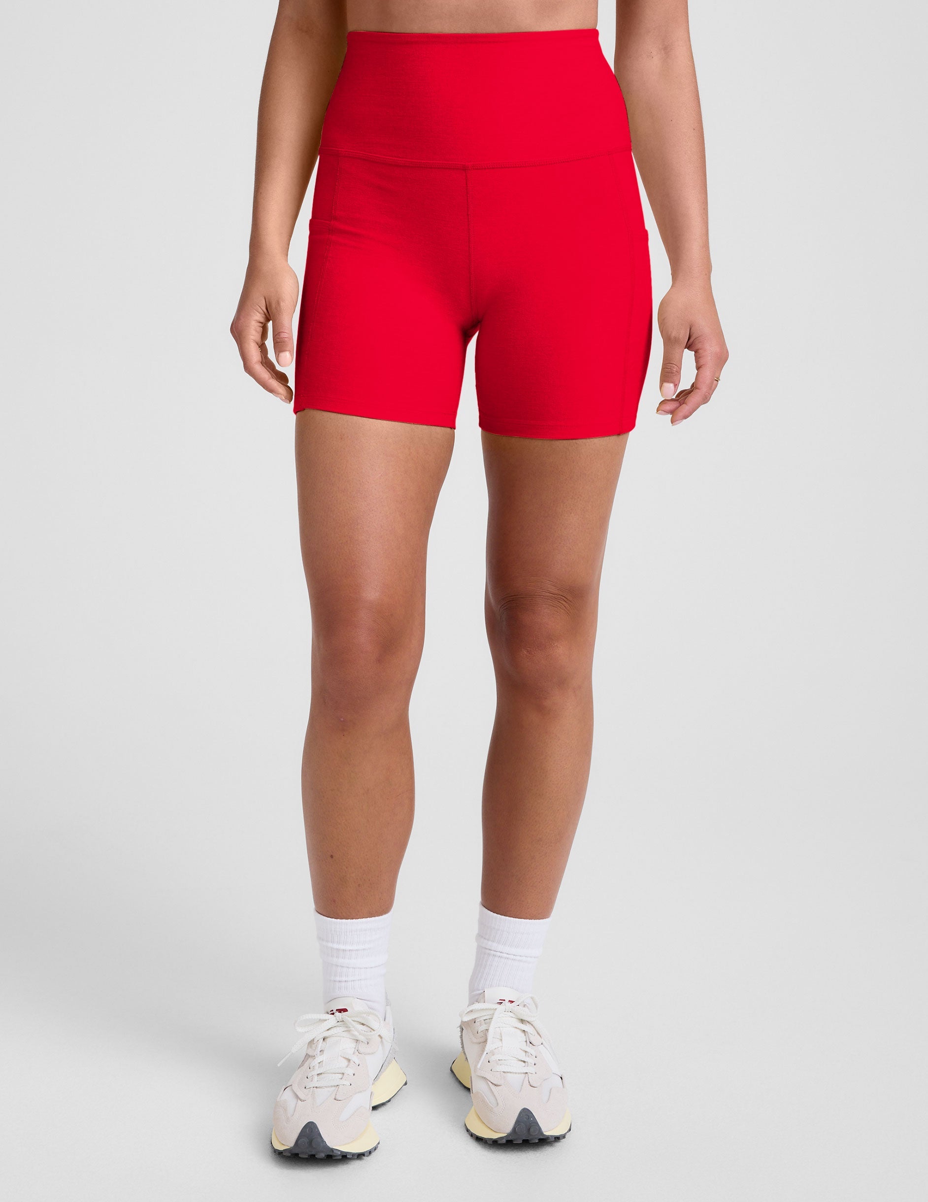 red high-waisted 5" inseam biker shorts with pockets. 