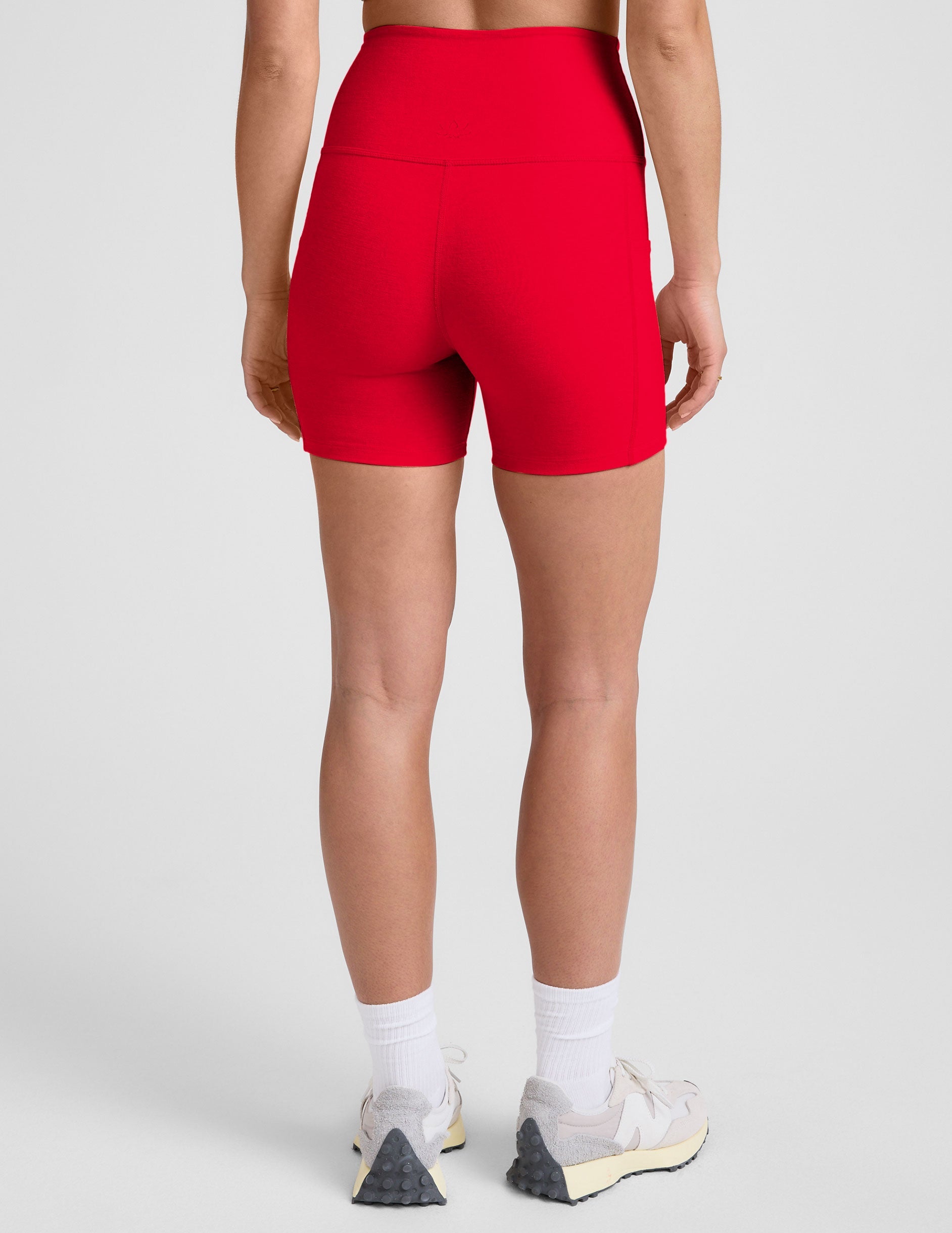 red high-waisted 5" inseam biker shorts with pockets. 