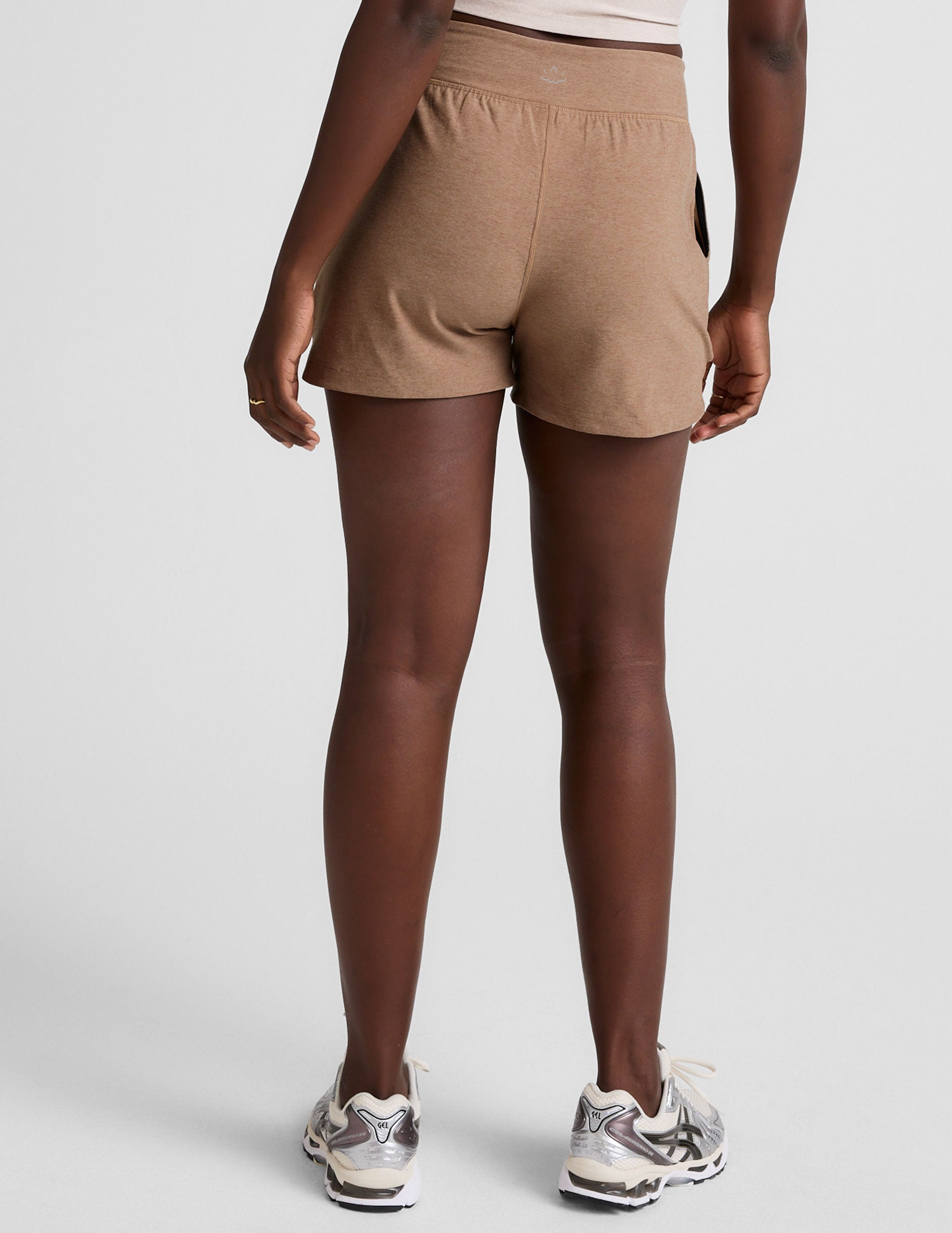 brown mid-rise 3" inseam shorts with pockets. 