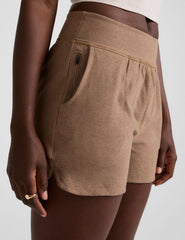 brown mid-rise 3" inseam shorts with pockets. 