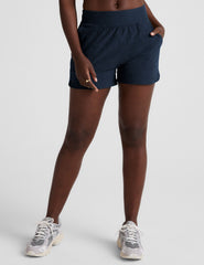 blue mid-rise spacedye shorts with pockets.