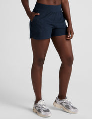 blue mid-rise spacedye shorts with pockets.