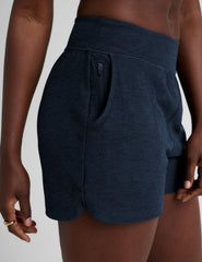 blue mid-rise spacedye shorts with pockets.