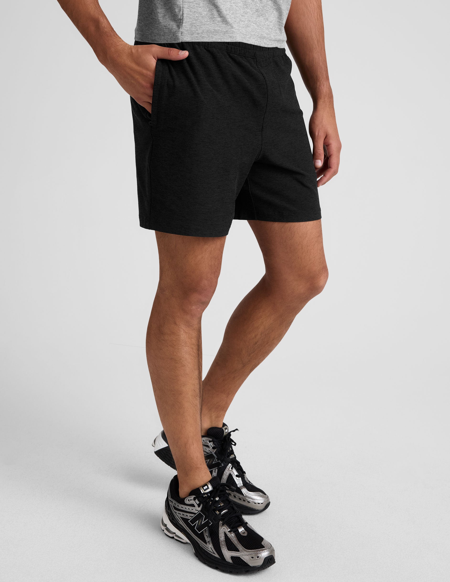 black men's spacedye shorts against a plain background.