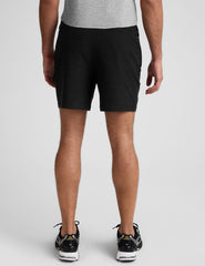 black men's spacedye shorts against a plain background.
