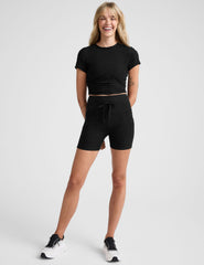 black high-waisted 5" inseam biker shorts with pockets and a drawstring at waistband. 