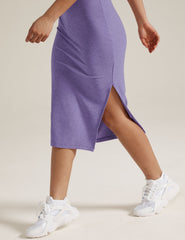 purple square neck body con midi dress with a front side slit.