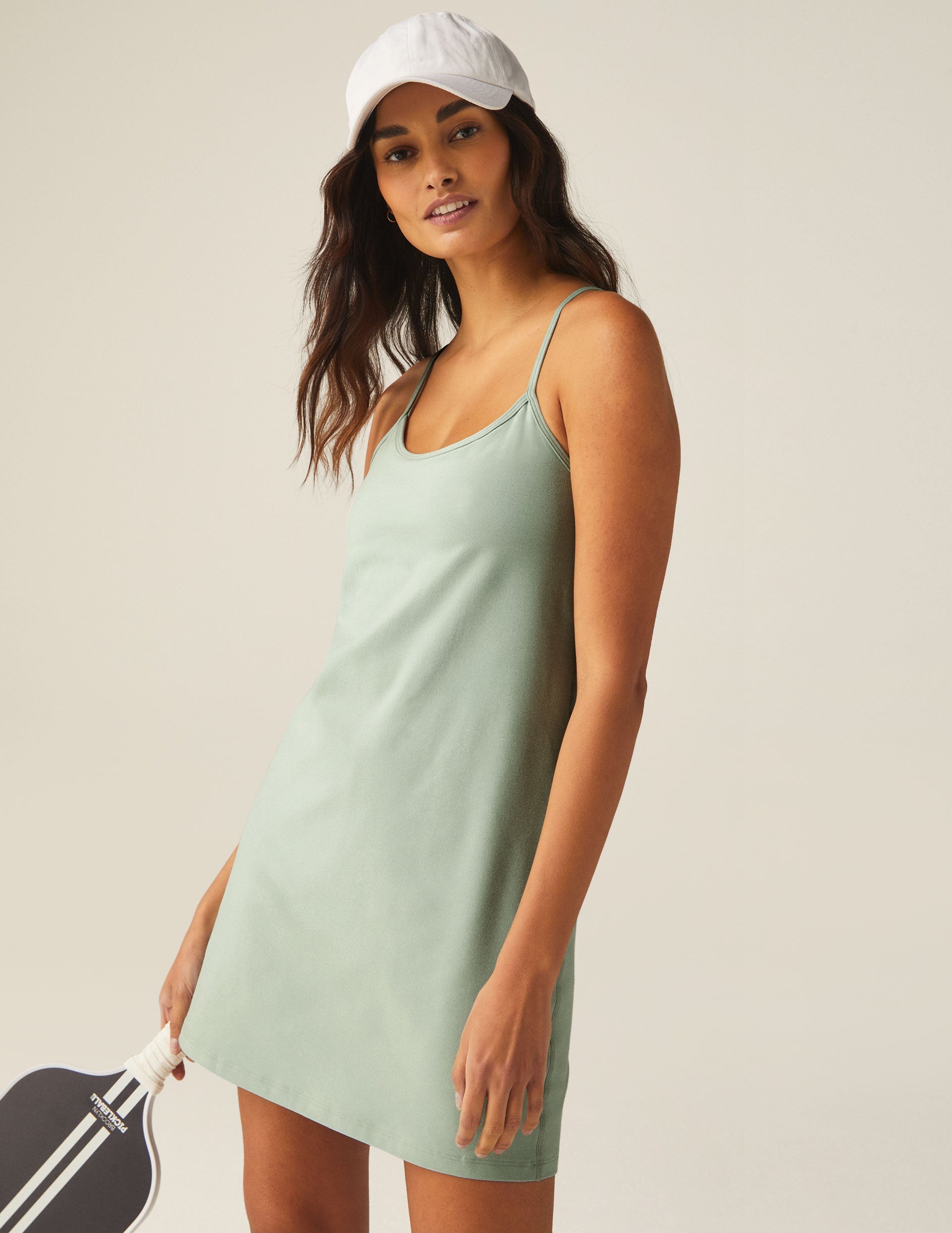 green mini spacedye dress with built-in pocket shorts.