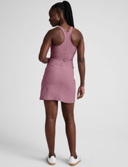 pink high-neck racerback mini dress.