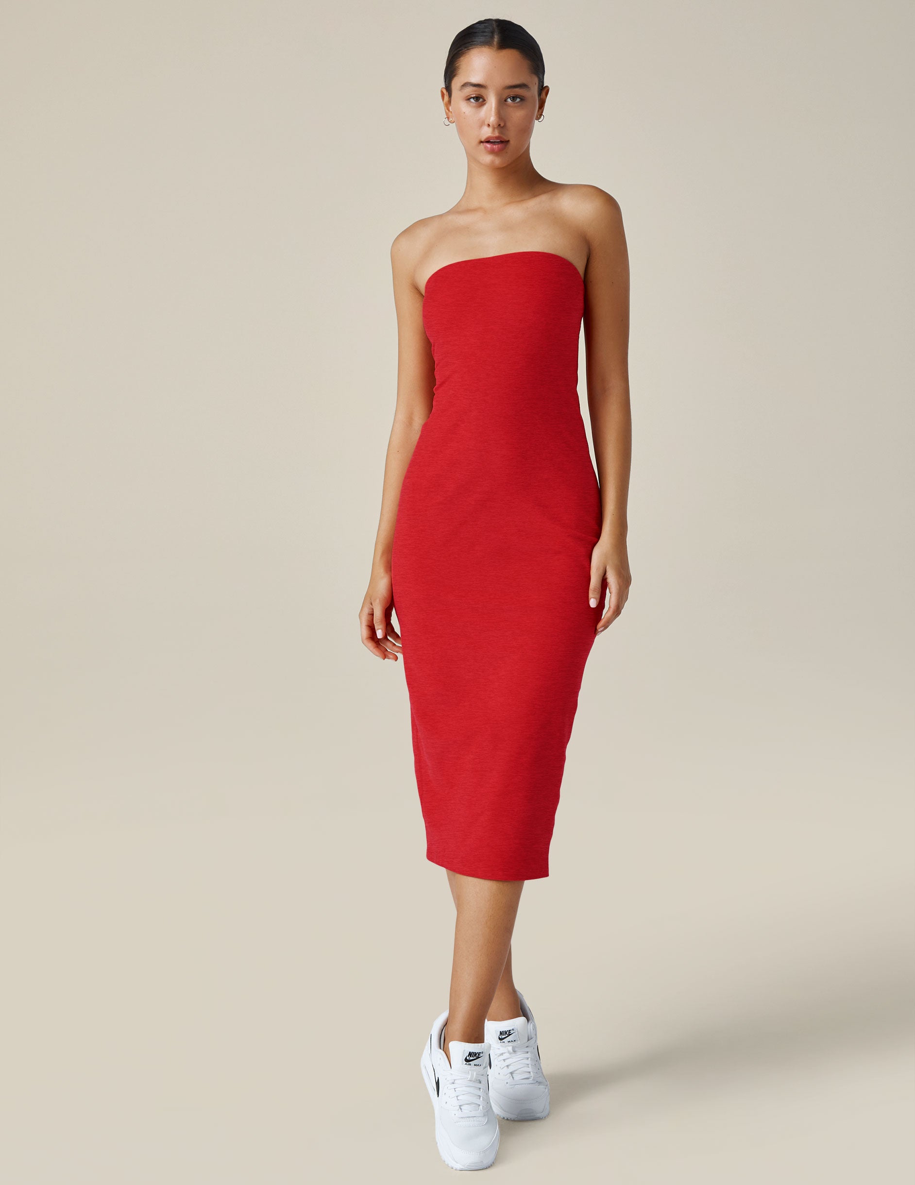 red strapless midi length dress.