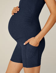 blue v-neck maternity biker jumpsuit with pockets.