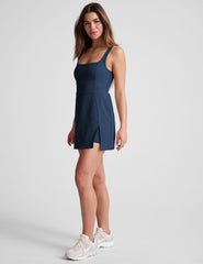 blue square neck mini dress with built-in shorts and a front side slit.