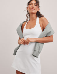 white halter neck mini dress.