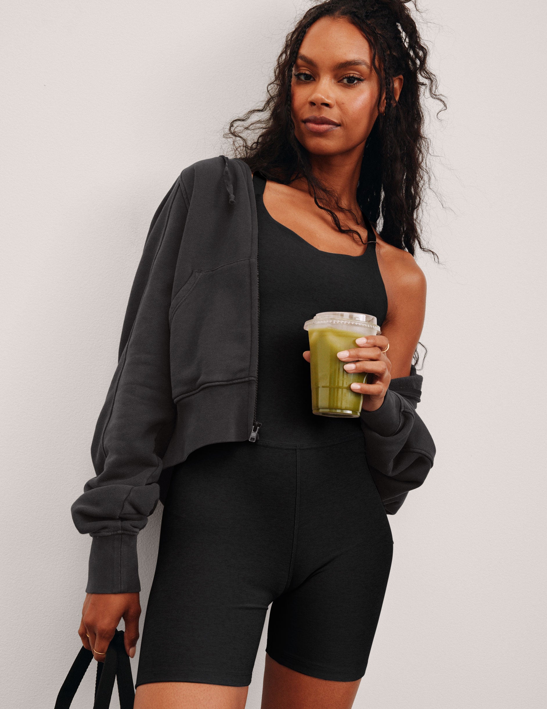 black biker jumpsuit with a built-in shelf bra and 5" inseam. 