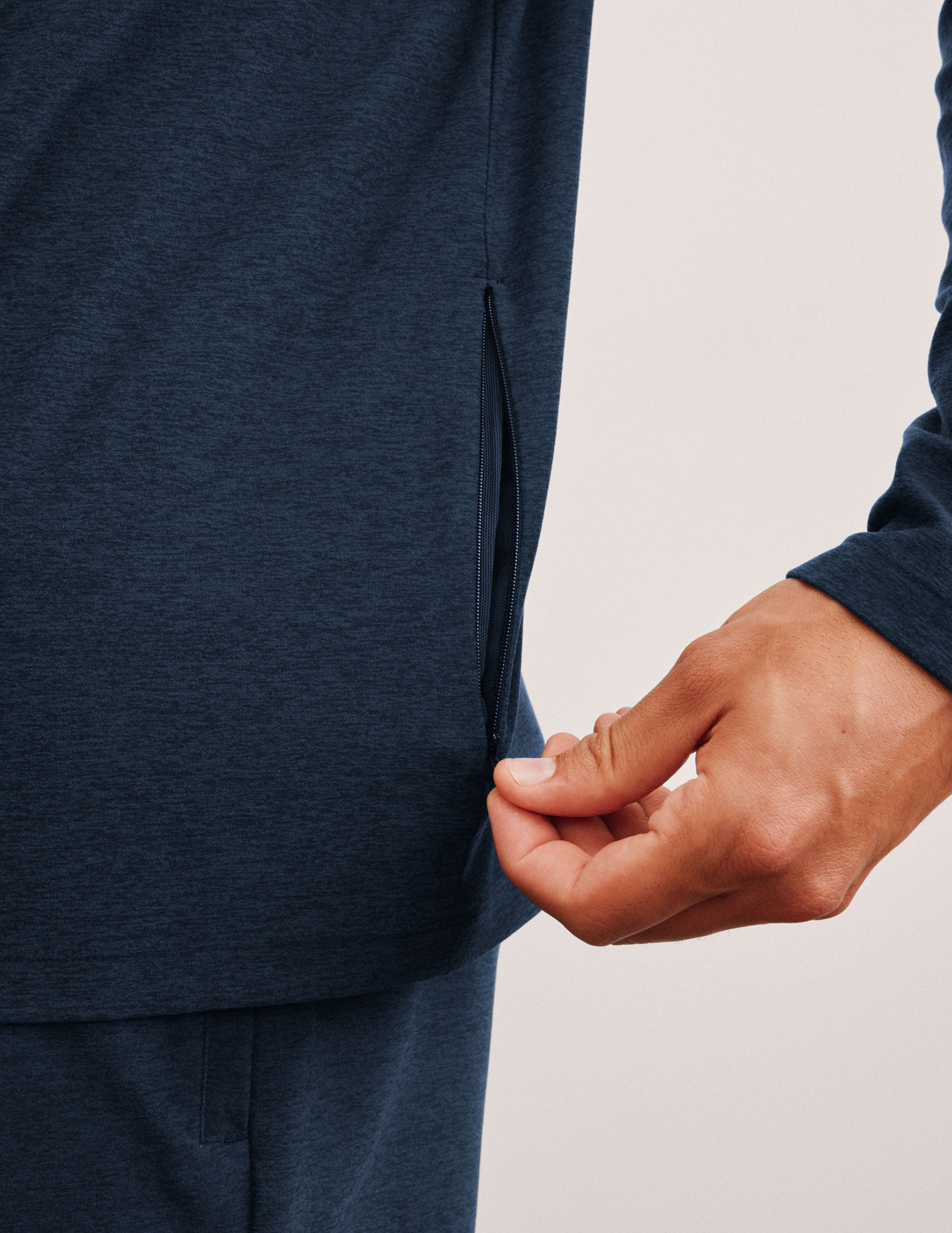 blue men's hooded pullover.