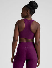 purple v-neck sports bra with remove-able pads.