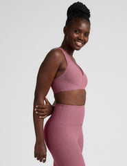 pink v-neck racerback bra with remove-able padding.