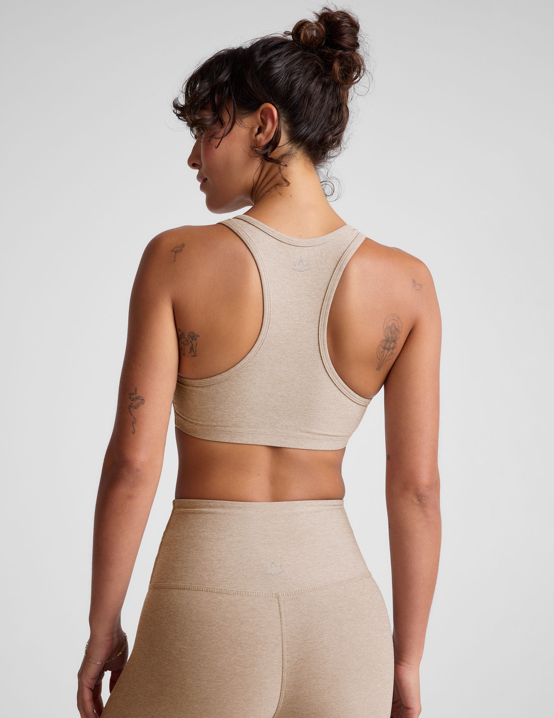 brown v-neck active bra with self lining and remove-able bra pads.