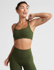 green racerback bra with thin straps.
