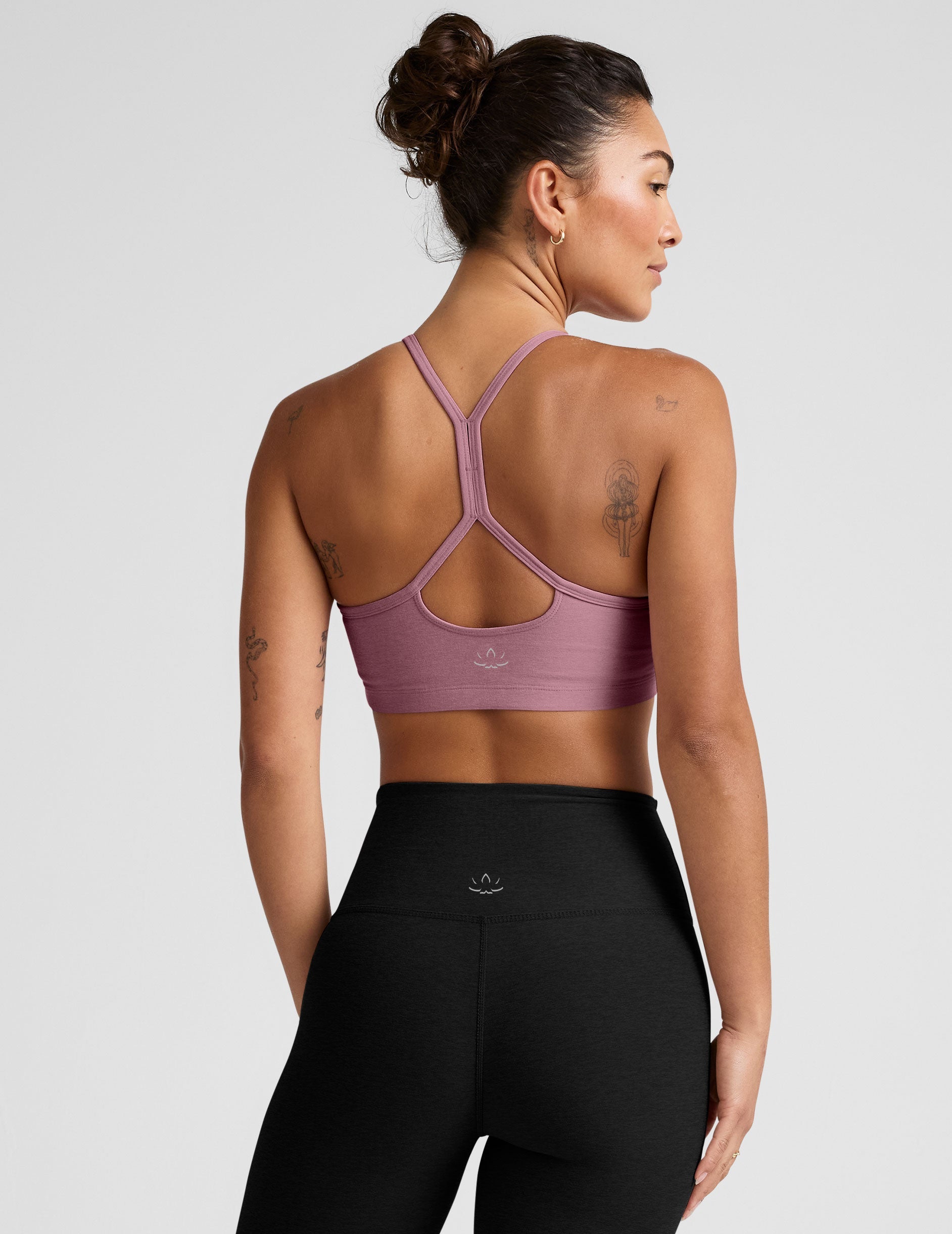 pink racerback bra with slim straps.