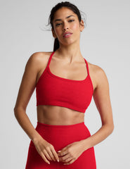 red racerback bra with slim straps.