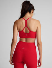 red racerback bra with slim straps.