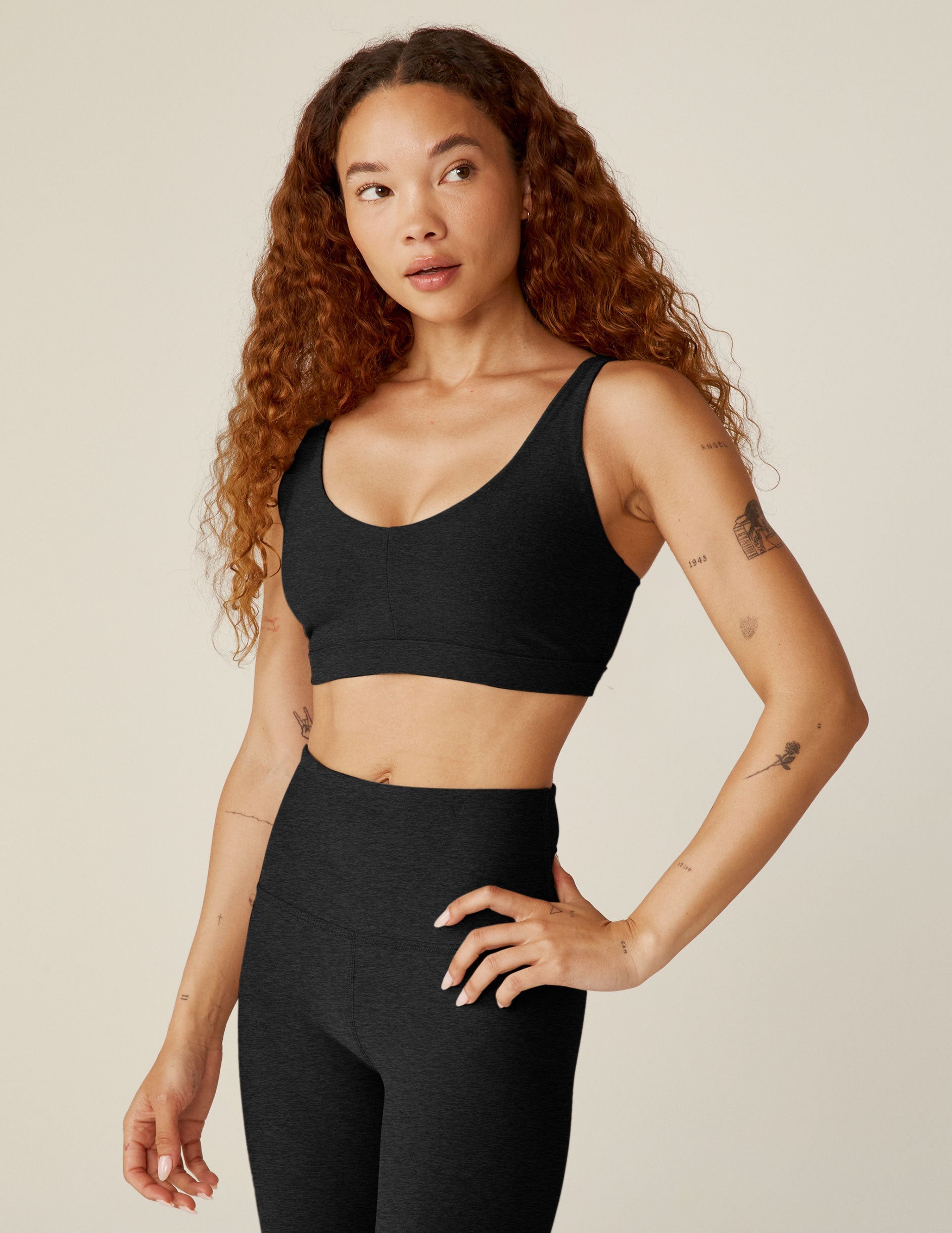 black sports bra with remove-able pads and adjusting straps.