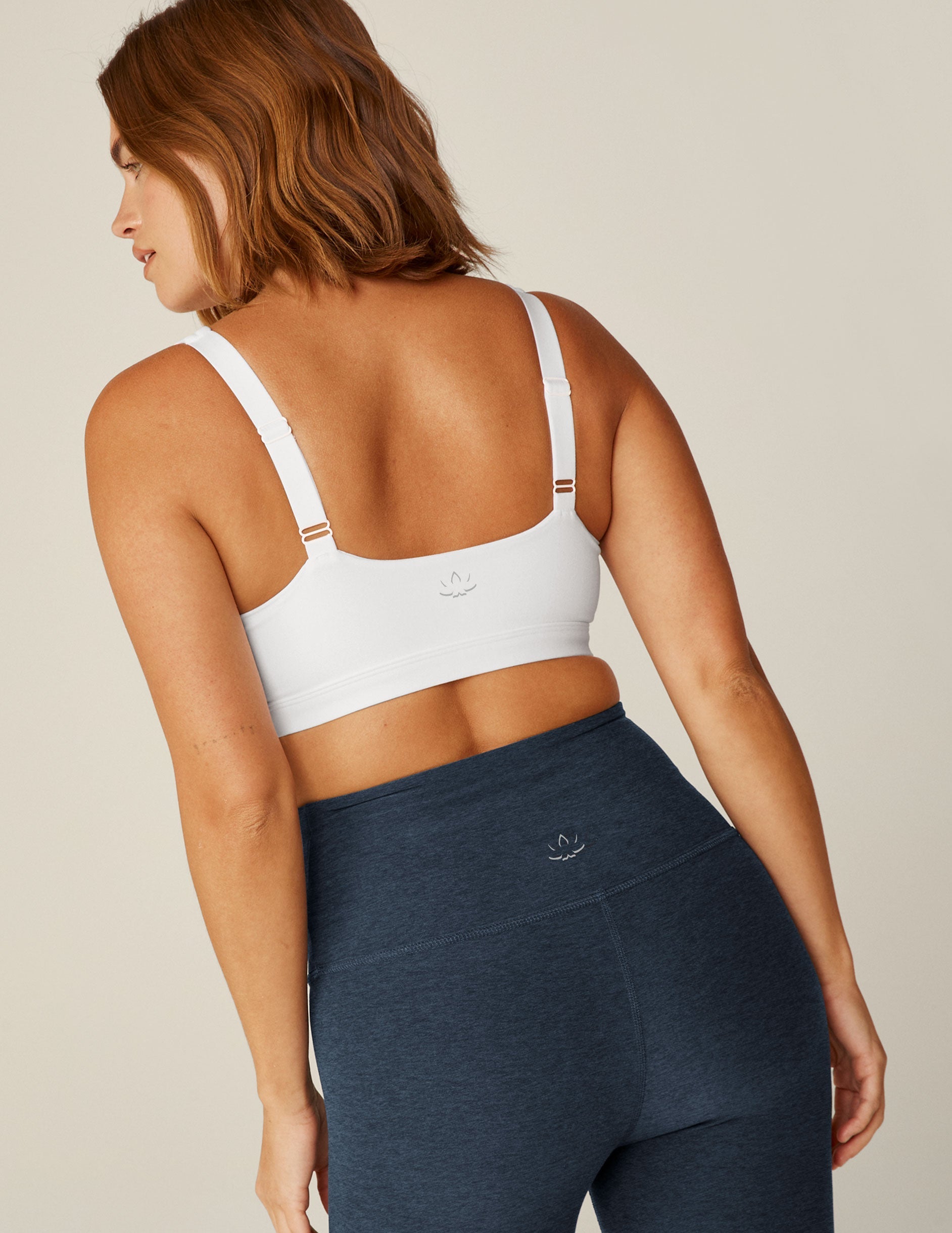 white v-neck bra top with removeable pads and adjustable straps.