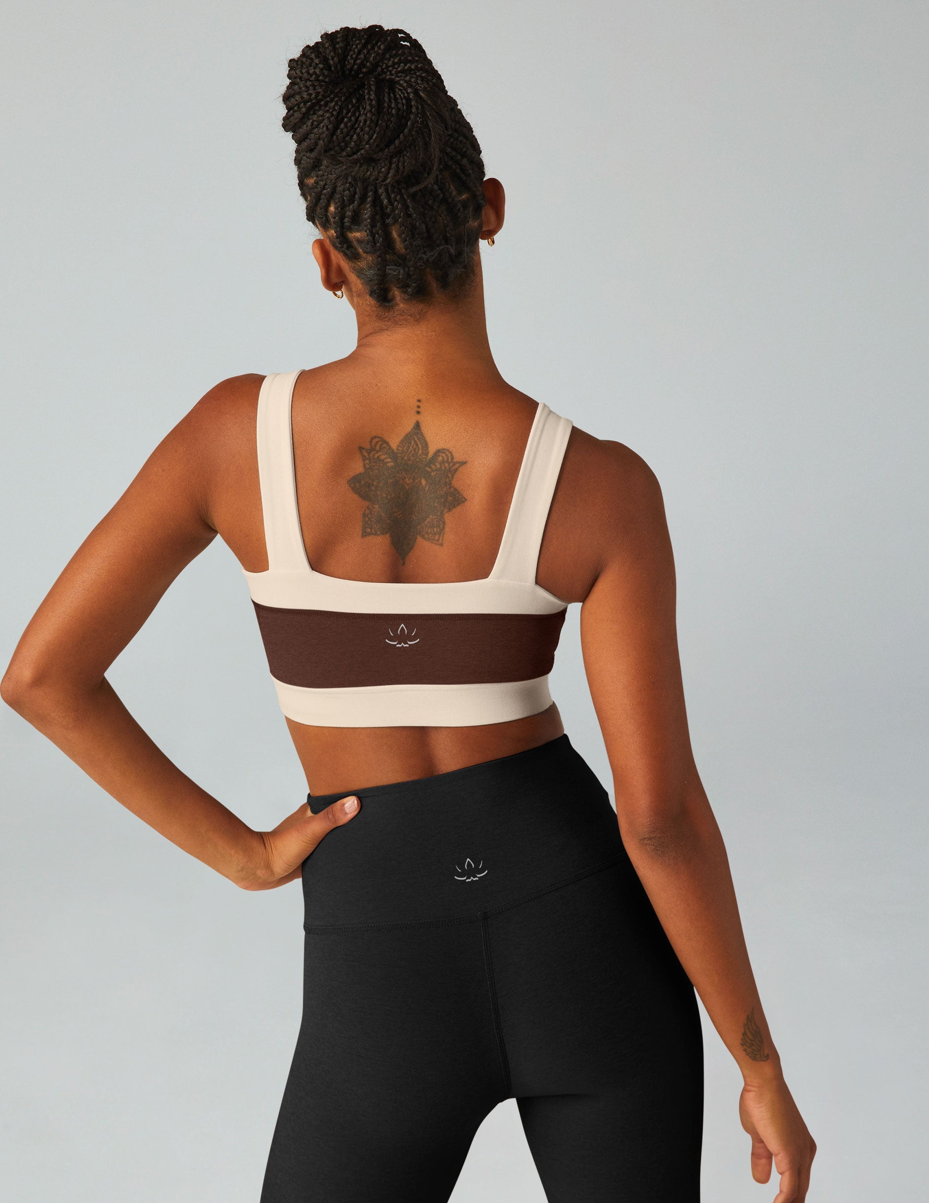 brown square neck bra top with white outlining.