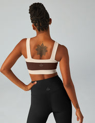 brown square neck bra top with white outlining.