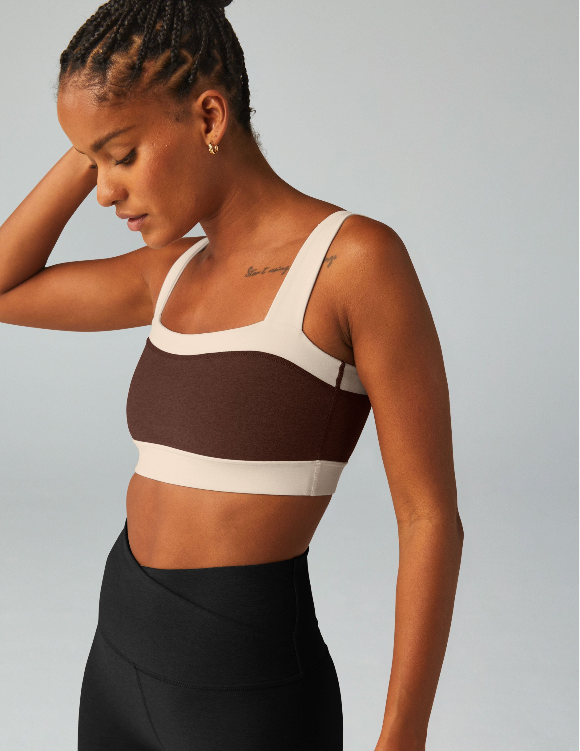 brown square neck bra top with white outlining.