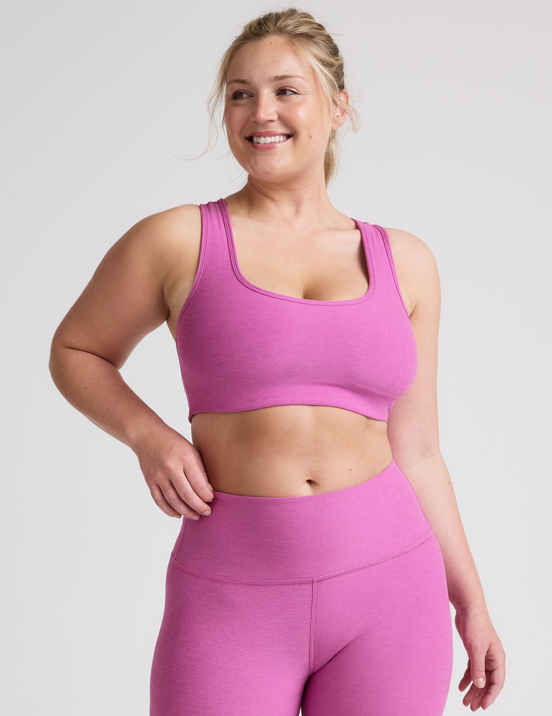 pink medium support racerback bra with a 2" hemband. 