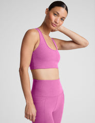 pink medium support racerback bra with a 2" hemband. 