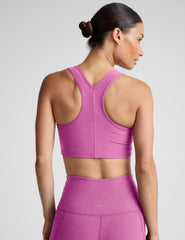 pink medium support racerback bra with a 2" hemband. 