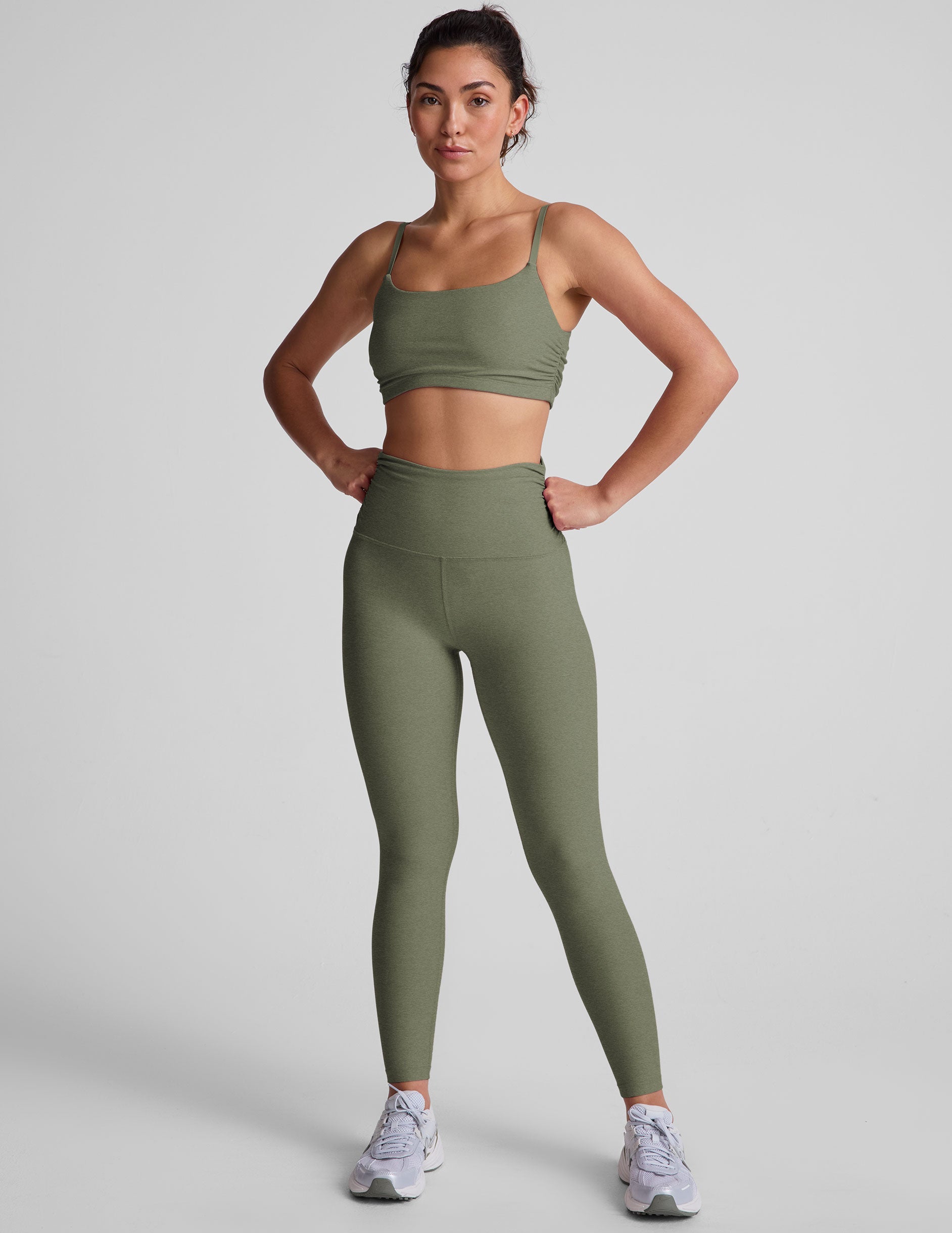 green slim strap bra top with shirred detailing on sides.