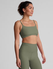 green slim strap bra top with shirred detailing on sides.
