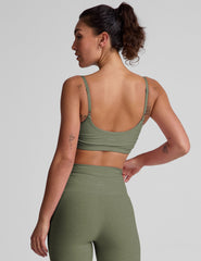 green slim strap bra top with shirred detailing on sides.