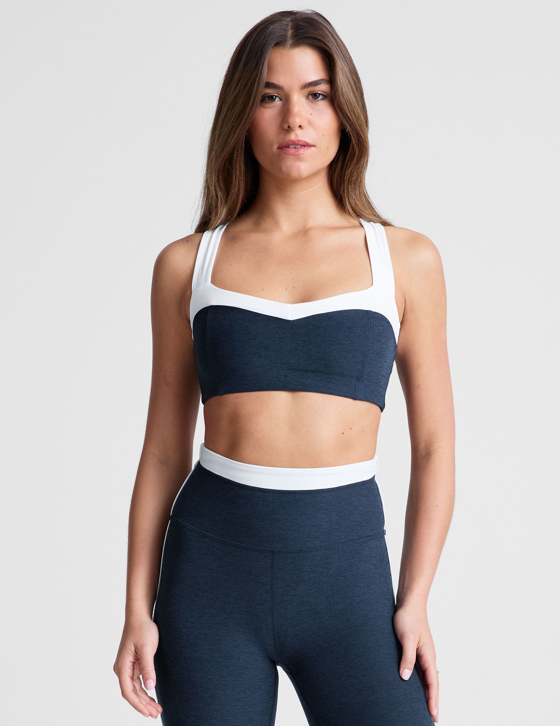navy blue bra top with a colorblock sweetheart neckline.