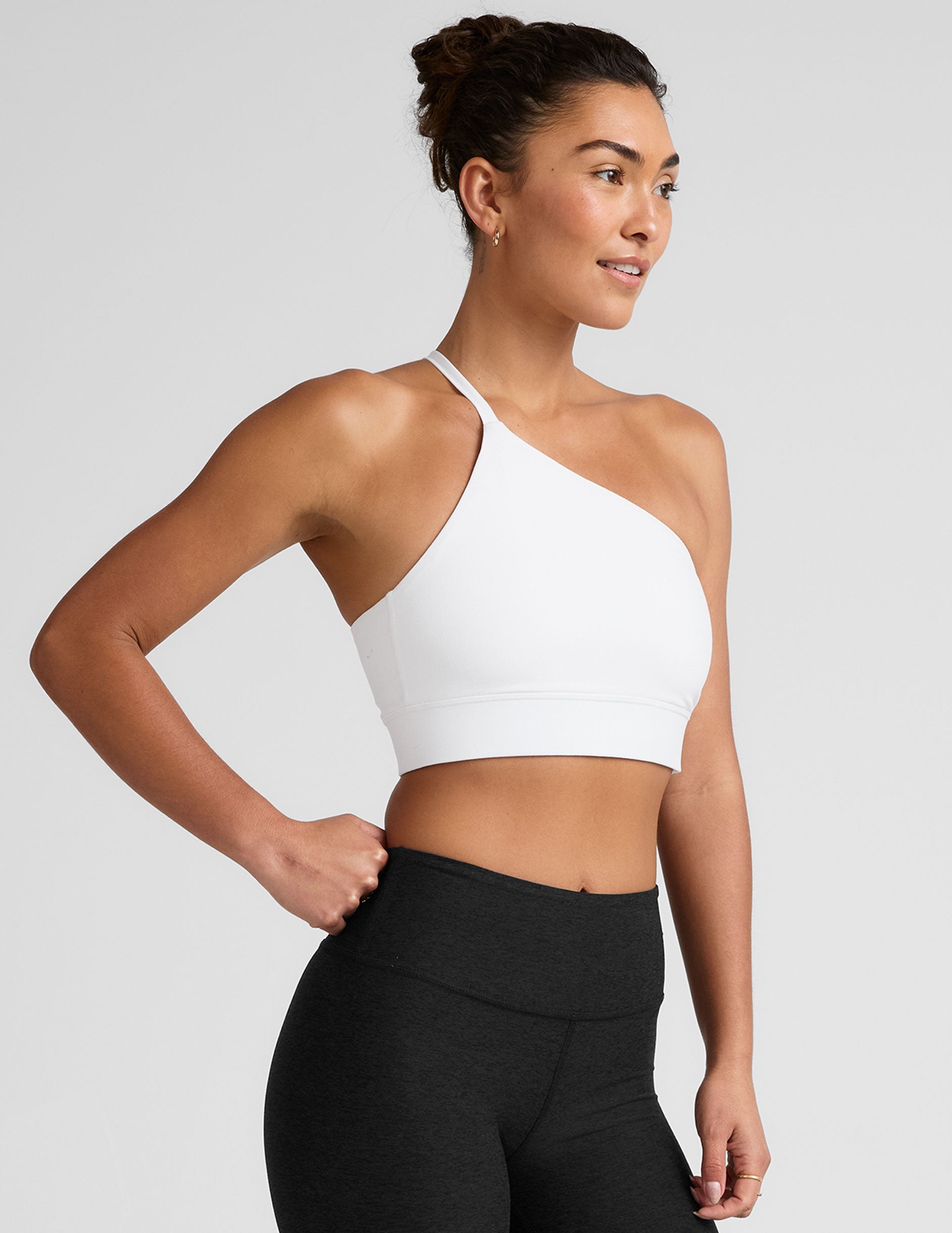 white long line length bra with a one strap detail and open back.