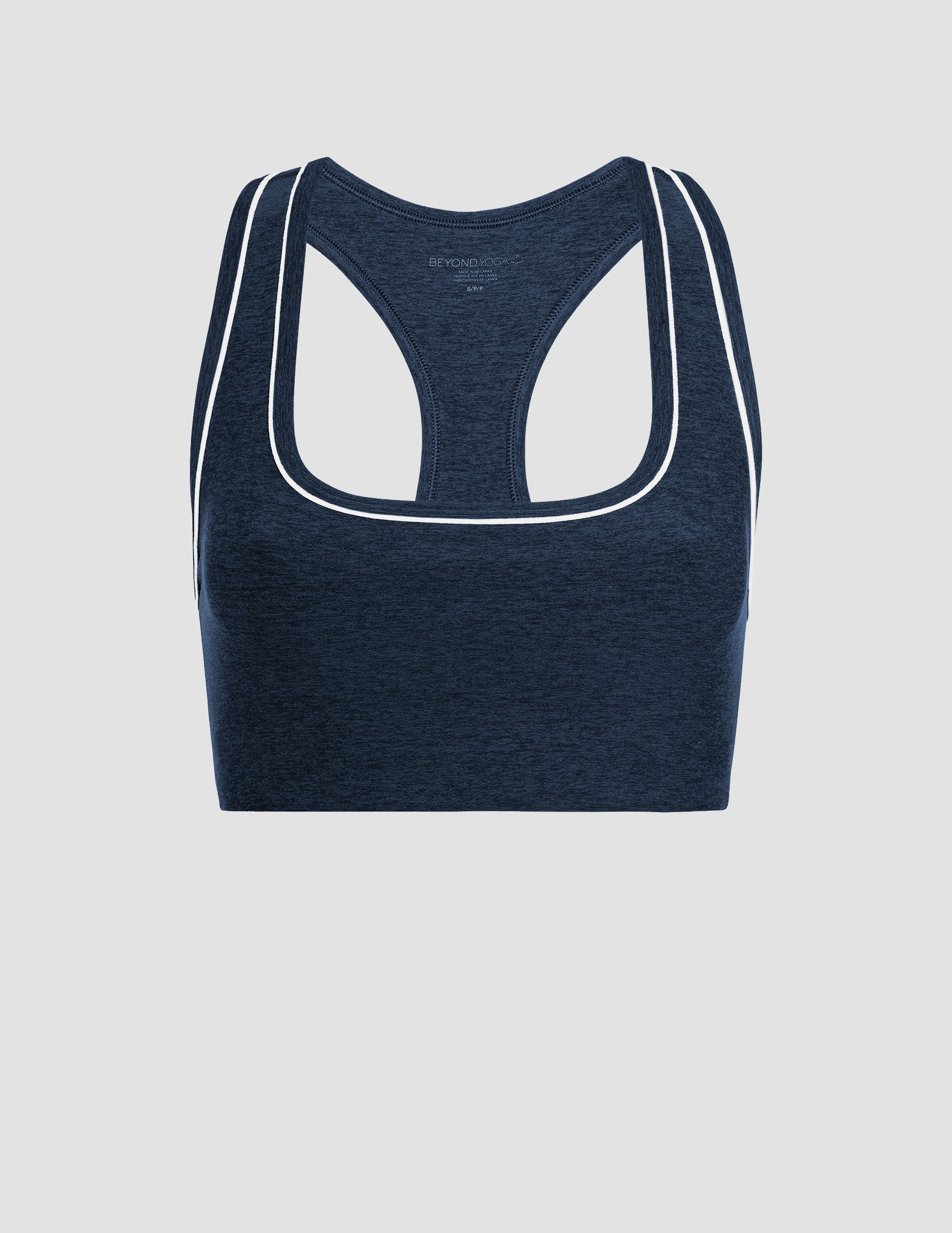 blue scoop neck racerback bra with white contrast trim.