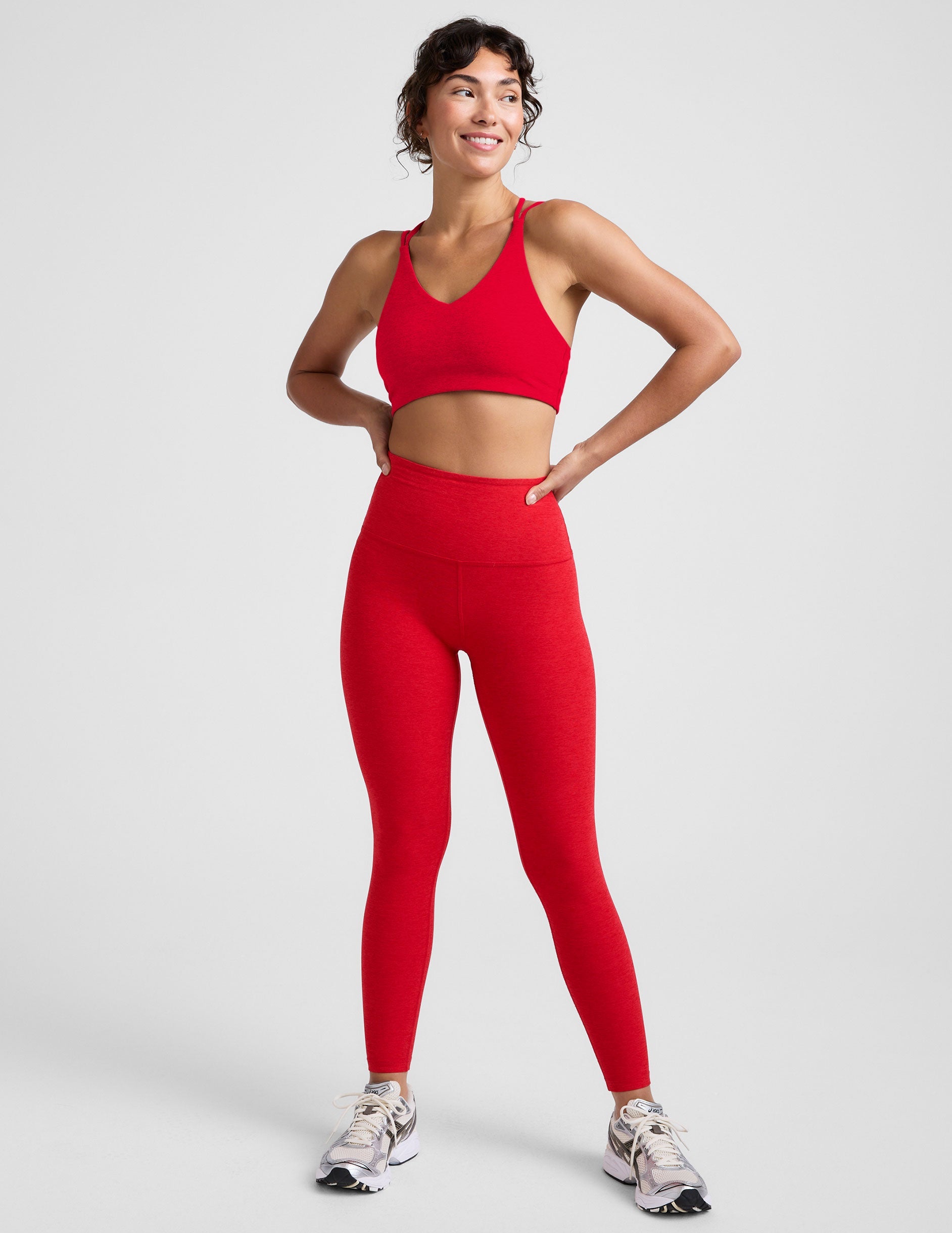 red v-neck bra top with crossover straps in the back.
