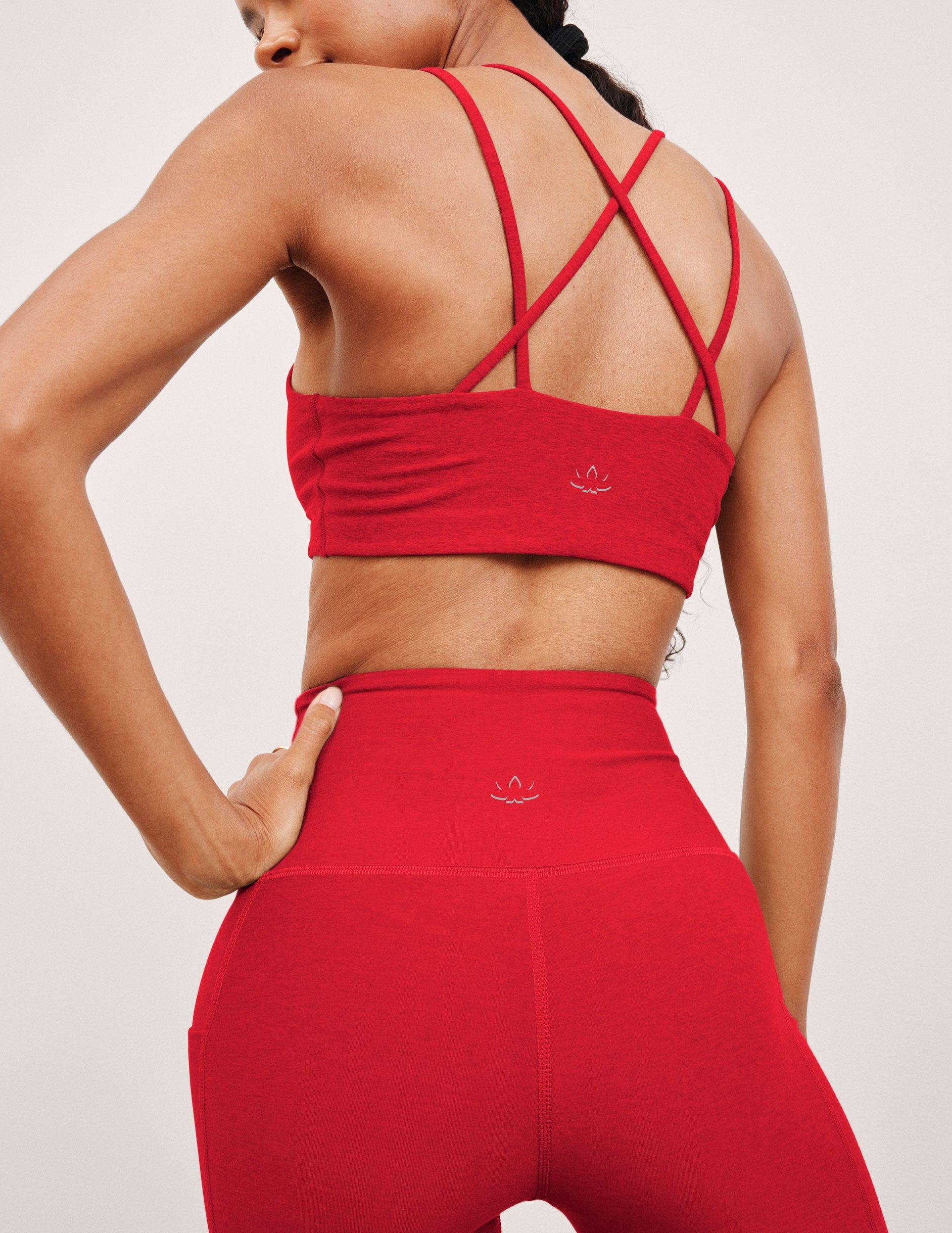 red v-neck bra top with crossover straps in the back.