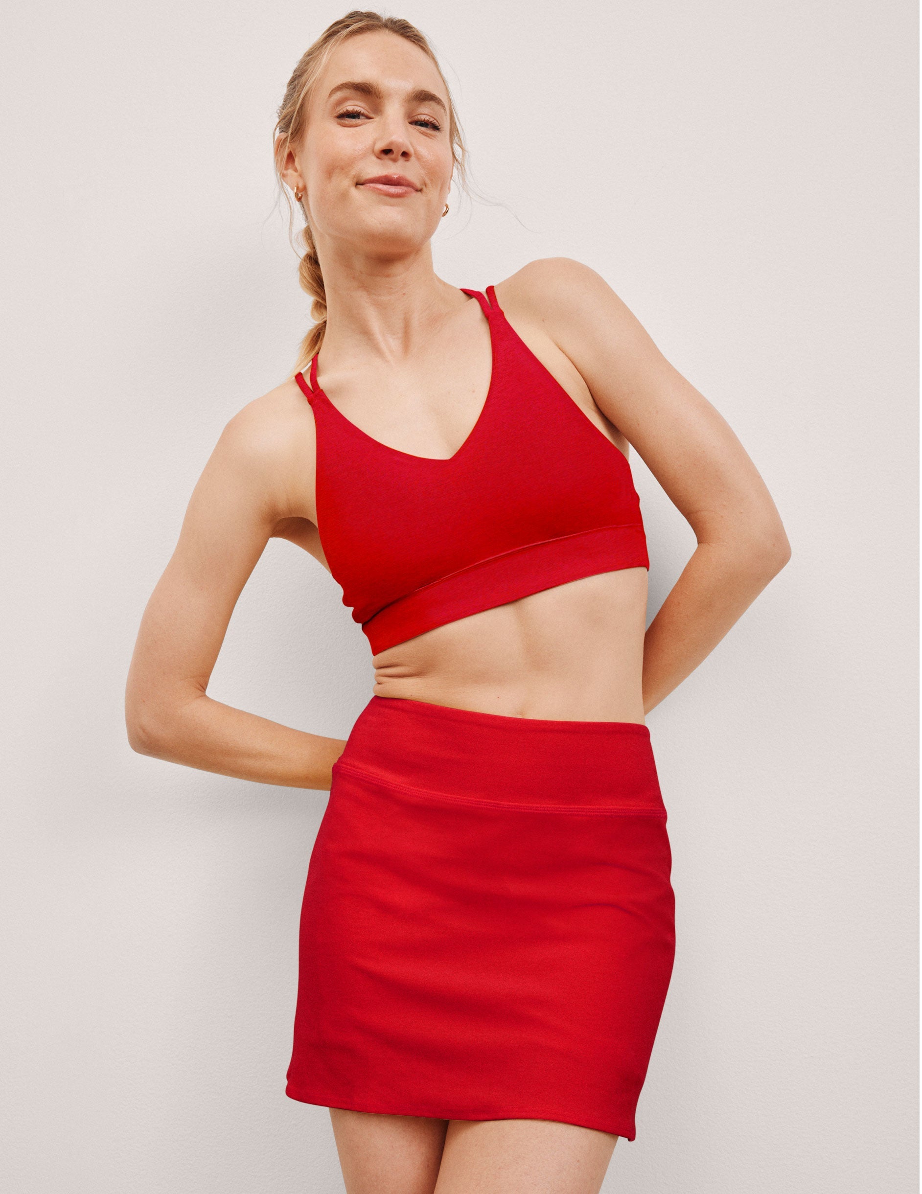 red v-neck bra top with crossover straps in the back.