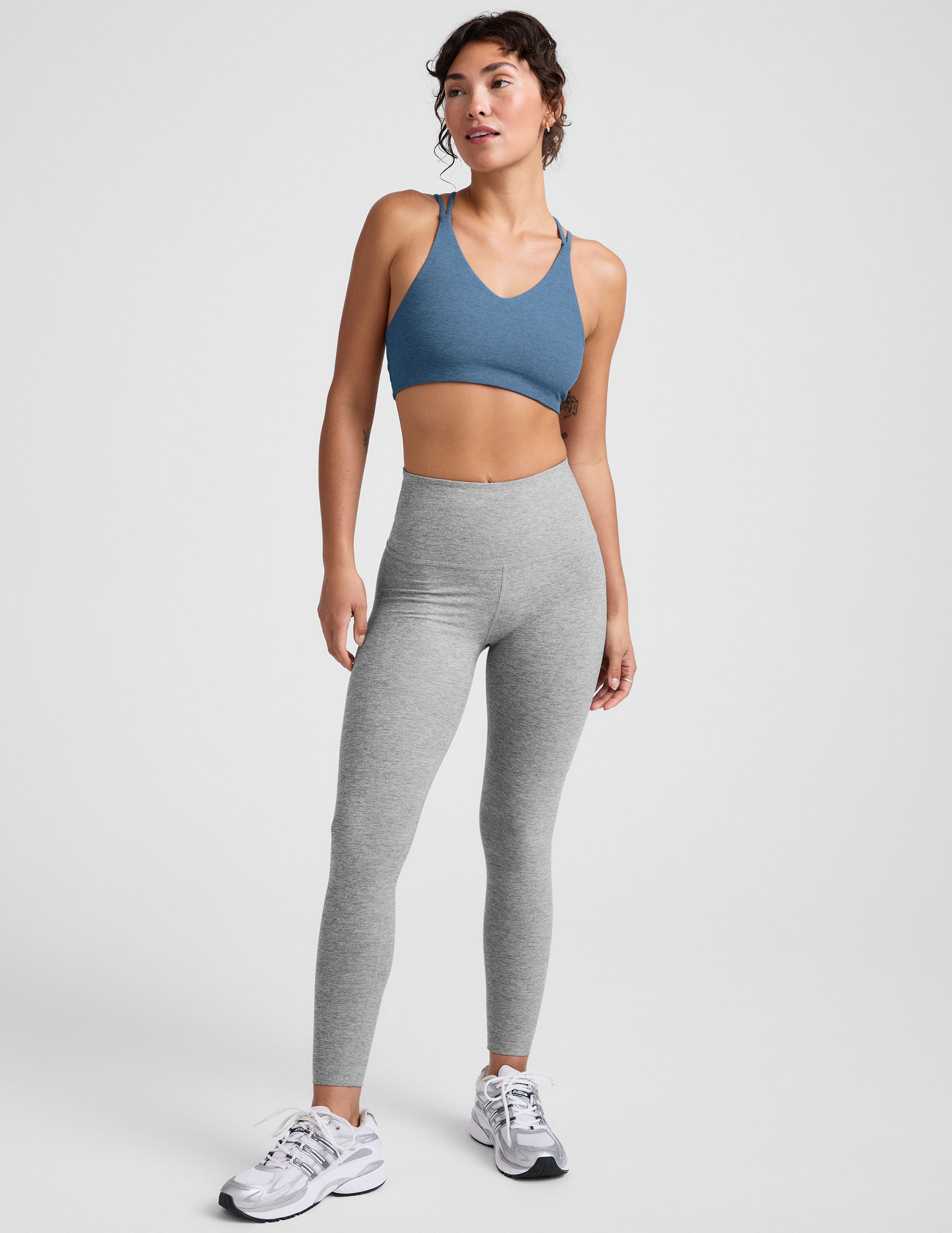 blue v-neck bra with crossover back straps.