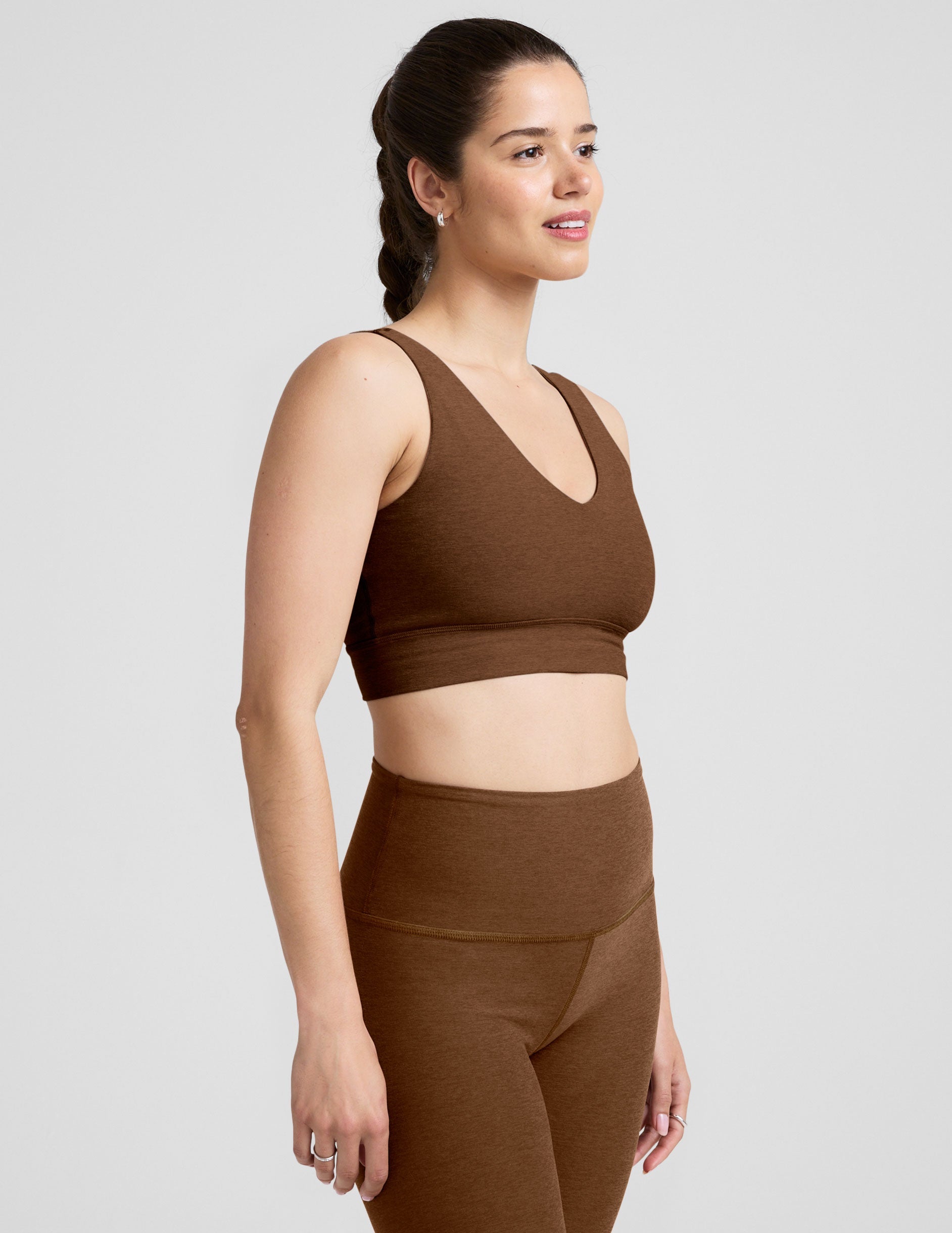 brown long line style bra with a v-neck in back and front.